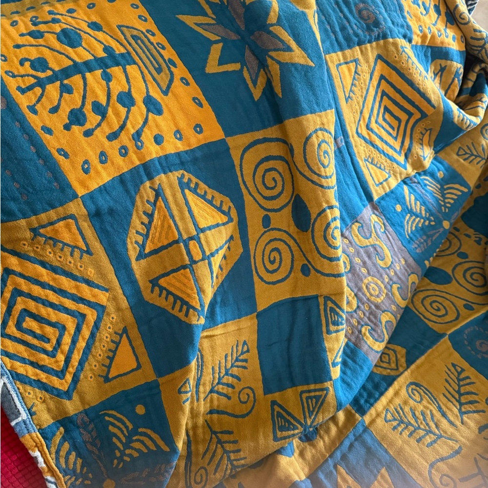 100% muslin cotton Geometric Patterned Teal and Mustard blanket (both $50)